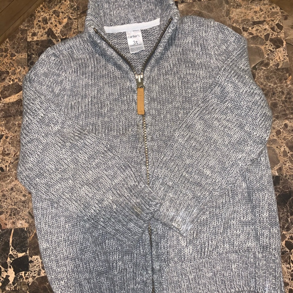 Zip down turtleneck sweater...